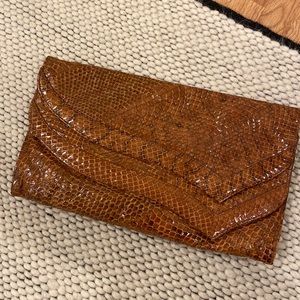 Vintage brown snakeskin clutch.